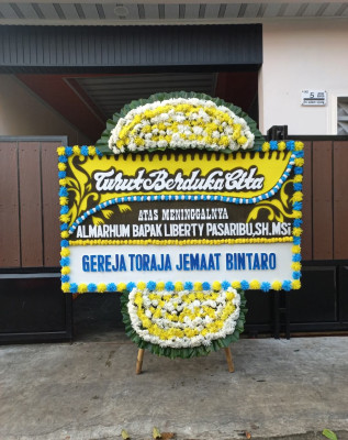 Papan Bunga Duka di Pengenjek
